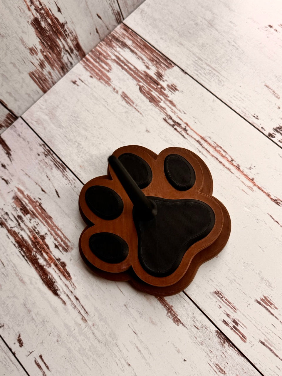 Brown Paw Print Yarn Spinner