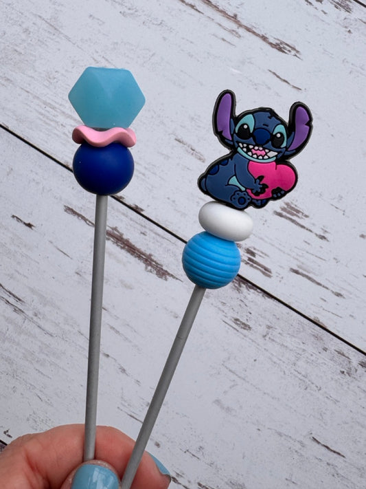 Blue Alien Holding a Heart Pair of Amigurumi Sewing Sticks