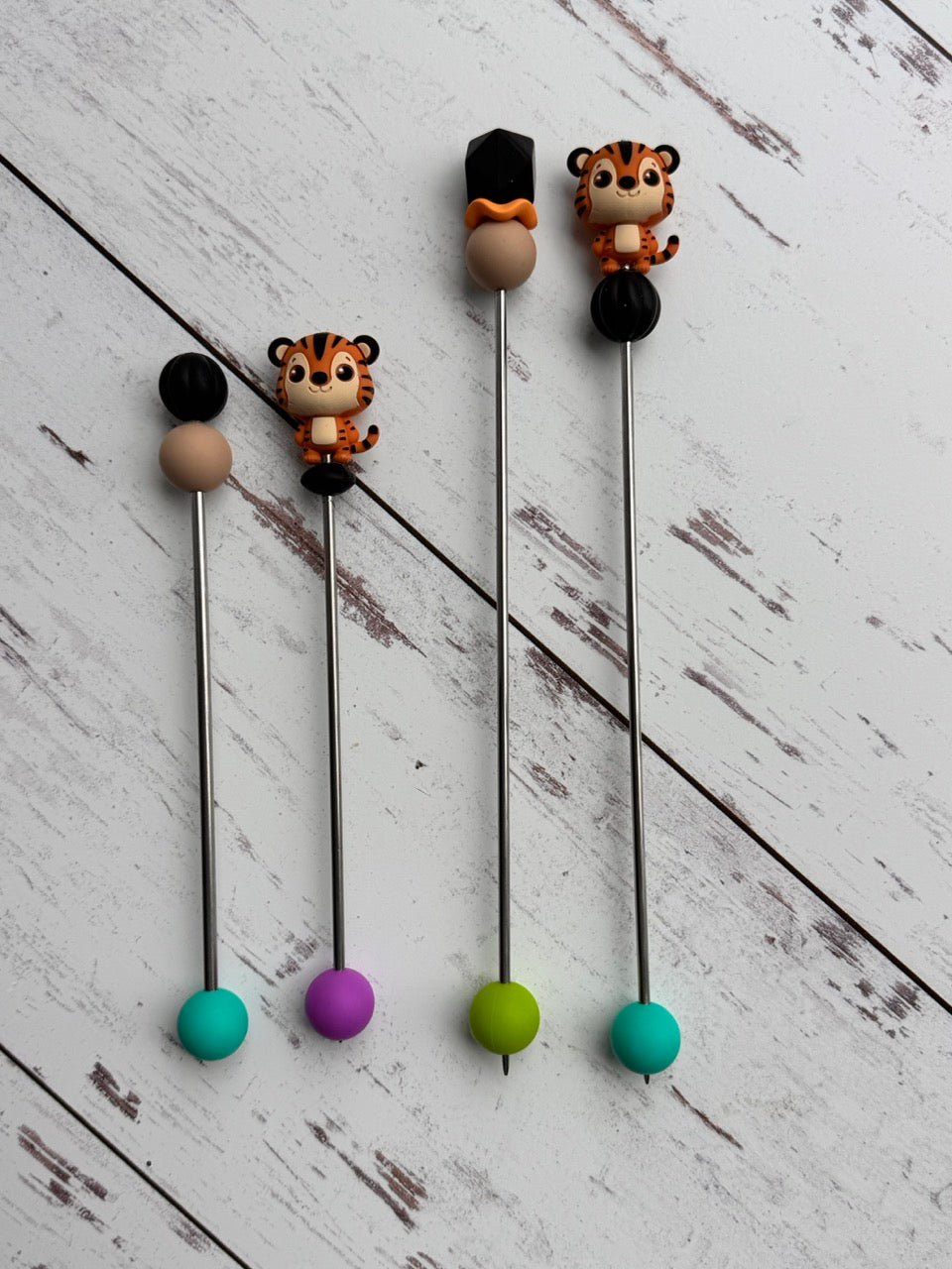 Pair of Orange and Black Tiger Amigurumi Sewing Sticks