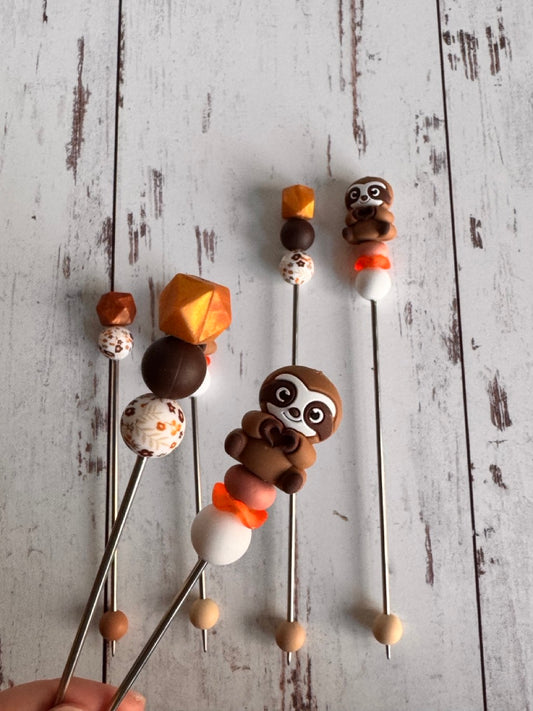 Pair of Brown Sloth Amigurumi Sewing Sticks
