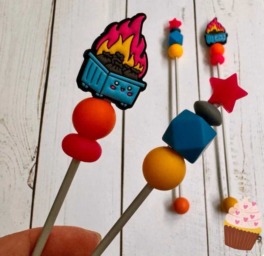 Pair of Blue Dumpster Fire Amigurumi Sewing Sticks